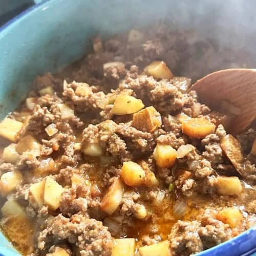 A delicious plate of Mom's Ground Beef with Potatoes, showcasing a hearty meal.